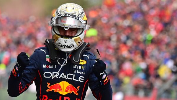 Red Bull Racing's Dutch driver Max Verstappen celebrates victory after the Emilia Romagna Formula One Grand Prix at the Autodromo Internazionale Enzo e Dino Ferrari race track in Imola, Italy, on April 24, 2022. (Photo by ANDREJ ISAKOVIC / AFP)
