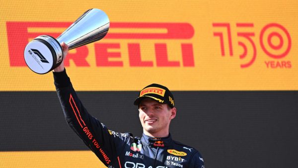 Red Bull's Dutch driver Max Verstappen celebrates on the podium after the Spanish Formula One Grand Prix at the Circuit de Catalunya on May 21, 2022 in Montmelo, on the outskirts of Barcelona. (Photo by GABRIEL BOUYS / AFP)