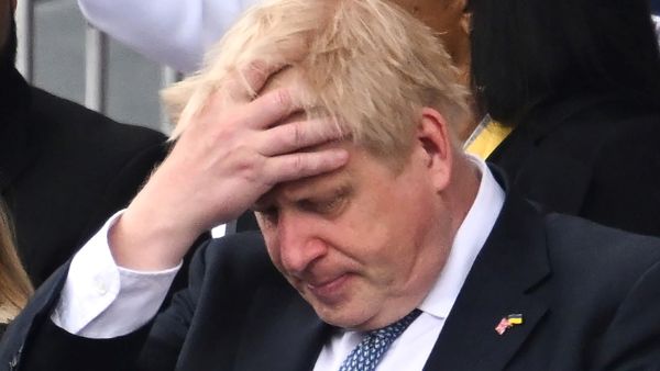 Britain's Prime Minister Boris Johnson reacts during the Platinum Pageant in London on June 5, 2022 as part of Queen Elizabeth II's platinum jubilee celebrations. (Photo by Leon Neal / POOL / AFP) Britain's Prime Minister Boris Johnson