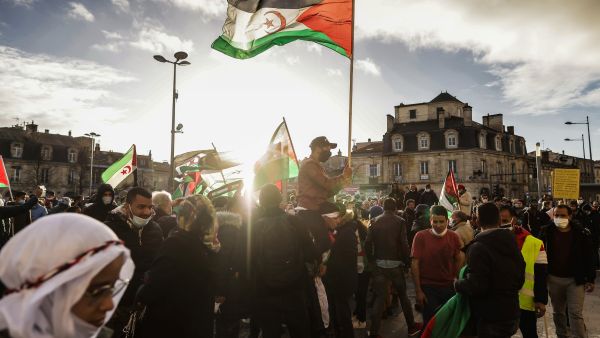 Supporters of Western Sahara's independence hold Western Sahara flags during a demonstration, in Bordeaux, southwestern France on December 12, 2020. AFP / thibaud MORITZ Western Sahara