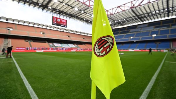 he logo of AC Milan is pictured on a corner flag prior to the Italian Serie A football match AC Milan vs Sassuolo at the San Siro stadium in Milan. AC Milan announced that its current owners, investment fund Elliot Advisors, have agreed to sell the newly-crowned Italian A champions to rival fund RedBird for 1.2 billion euros ($1.3 billion). (Photo by MIGUEL MEDINA / AFP) 