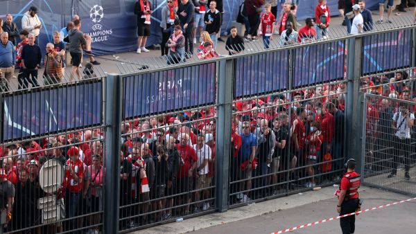  Liverpool fans stand outside unable to get in in time leading to the match being delayed prior to the UEFA Champions League final football match between Liverpool and Real Madrid at the Stade de France in Saint-Denis, north of Paris, on May 28, 2022. (Photo by Thomas COEX / AFP)