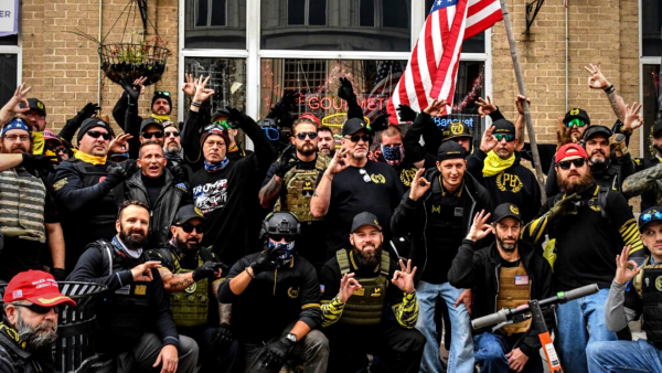 December 2020: Members of the Proud Boys pose for a photo while flashing a gesture associated with the white power movement outside of Harry's bar during a protest on December 12, 2020 in Washington, DC. Stephanie Keith/Getty Images/AFP / Getty Images via AFP / GETTY IMAGES NORTH AMERICA / STEPHANIE KEITH Trump Proud boys