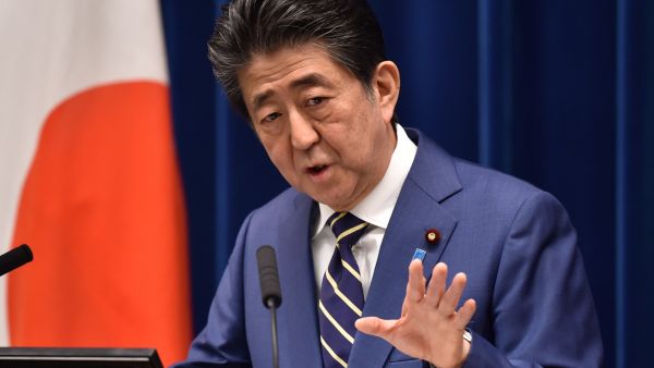 Former Japanese prime minister Shinzo Abe was attacked and left bleeding at a campaign event in the Nara region on July 8, 2022, local media reported. (Photo by Kazuhiro NOGI / AFP) Former Japanese prime minister