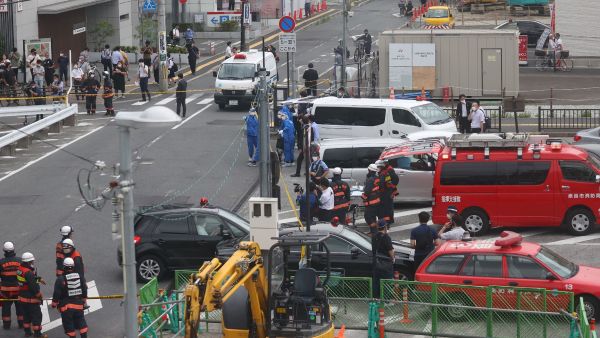A general view shows workers at the scene after an attack on Japan's former prime minister Shinzo Abe at Kintetsu Yamato-Saidaiji station square in Nara on July 8, 2022. (Photo by JIJI PRESS / AFP) prime minister Shinzo Abe