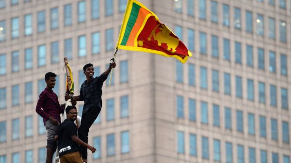 Millions of rupees in cash left behind by Sri Lanka's president when he fled his official residence was handed over to a court on July 11 after being turned in by protestors, police said as a succession battle got under way. (Photo by Arun SANKAR / AFP) Sri Lankan president fled on a military airplane