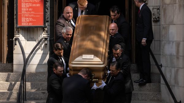 The remains of Ivana Trump are carried out from St Vincent Ferrer Roman Catholic Church during her funeral service in New York, on July 20, 2022. (Photo by Yuki IWAMURA / AFP) Ivana Trump