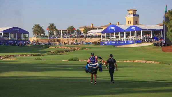 Collin Morikawa walks down the 18th during his 2021 DP World Tour Championship victory resize (Credit: Supplied)