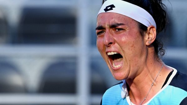 Tunisia's Ons Jabeur celebrates after defeating Greece's Maria Sakkari during their quarter finals match at the WTA Rome Open tennis tournament on May 13, 2022 at Foro Italico in Rome. (Photo by Tiziana FABI / AFP)