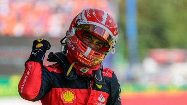 Ferrari's Monegasque driver Charles Leclerc celebrates after winning the Formula One Austrian Grand Prix on the Red Bull Ring race track in Spielberg, Austria, on July 10, 2022. (Photo by Jure Makovec / AFP)