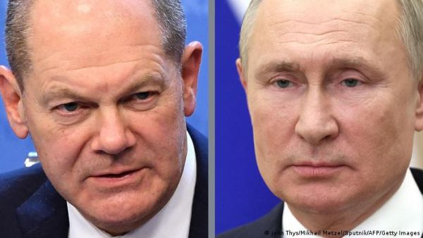 Schloz (L) Putin