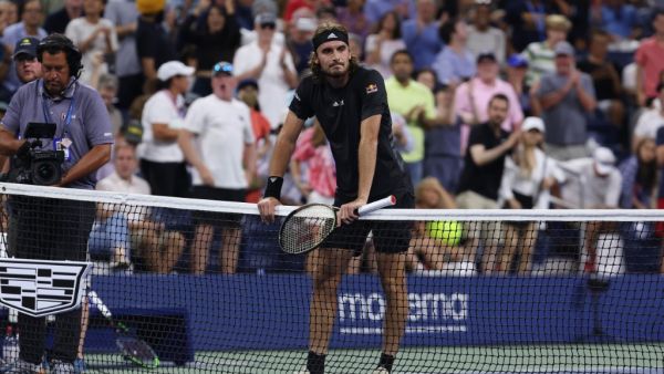 Stefanos Tsitsipas of Greece reacts after being defeated by Daniel Elahi Galan of Columbia during the Men's Singles First Round on Day One of the 2022 US Open at USTA Billie Jean King National Tennis Center on August 29, 2022 in the Flushing neighborhood of the Queens borough of New York City. Julian Finney/Getty Images/AFP (Photo by JULIAN FINNEY / GETTY IMAGES NORTH AMERICA / Getty Images via AFP)