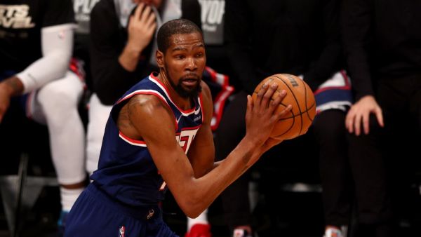 Kevin Durant #7 of the Brooklyn Nets takes the ball during Game Four of the Eastern Conference First Round Playoffs against the Boston Celtics at Barclays Center on April 25, 2022 in the Brooklyn borough of New York City. (Photo by ELSA / GETTY IMAGES NORTH AMERICA / Getty Images via AFP)