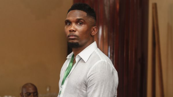 Samuel Eto'o Fils (C), an ex-Cameroonian footballer, is seen during the election of a new president of the Cameroon Football Federation (Fécafoot) at the Mont Fébé Hotel in Yaoundé on December 11, 2021. (Photo by Daniel Beloumou Olomo / AFP)