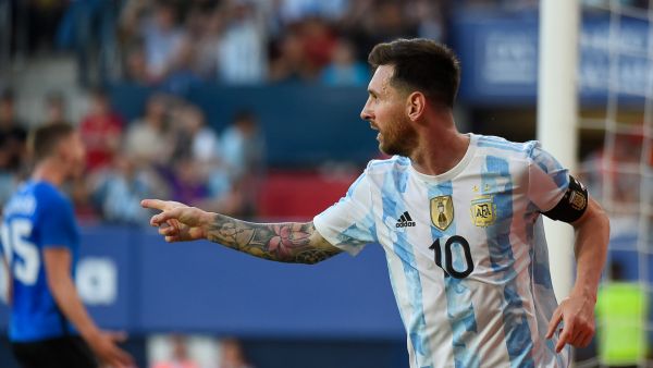 Argentina's forward Lionel Messi celebrates after scoring his team's second goal during the international friendly football match between Argentina and Estonia at El Sadar stadium in Pamplona on June 5, 2022. (Photo by ANDER GILLENEA / AFP)