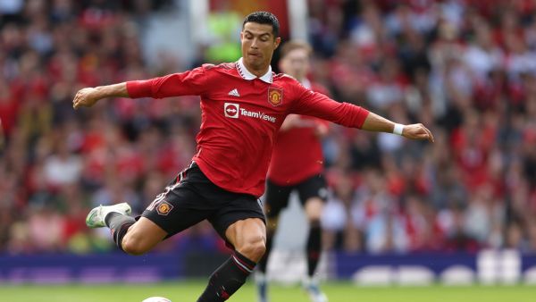 Manchester United's Portuguese striker Cristiano Ronaldo passes the ball during a pre-season club friendly football match between Manchester United and Rayo Vallecano at Old Trafford in Manchester, north west England, on July 31, 2022. (Photo by Nigel Roddis / AFP)