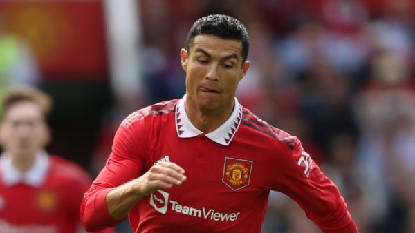 Manchester United's Portuguese striker Cristiano Ronaldo runs with the ball during a pre-season club friendly football match between Manchester United and Rayo Vallecano at Old Trafford in Manchester, north west England, on July 31, 2022. (Photo by Nigel Roddis / AFP)