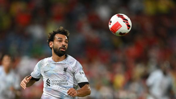 Liverpool's Egyptian forward Mohamed Salah looks towards the ball during the exhibition football match between English Premier League teams Manchester United and Liverpool FC at Rajamangala National Stadium in Bangkok on July 12, 2022. (Photo by MANAN VATSYAYANA / AFP)
