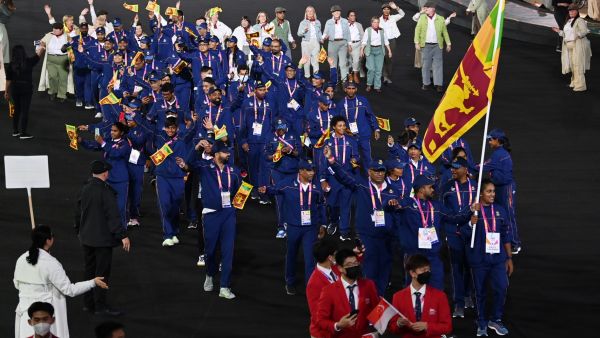 Athletes for Team Sri Lanka take part in the opening ceremony for the Commonwealth Games at the Alexander Stadium in Birmingham, central England, on July 28, 2022. (Photo by Glyn KIRK / AFP)