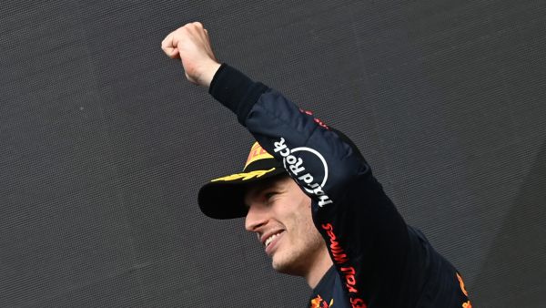 Red Bull Racing's Dutch driver Max Verstappen celebrates his victory during the podium ceremony of the Belgian Formula One Grand Prix at Spa-Francorchamps racetrack at Spa, on August 28, 2022. (Photo by JOHN THYS / AFP)