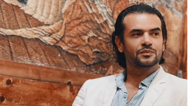  the Syrian artist was convicted of "tax evasion"