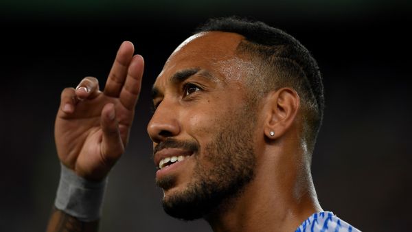 Gabonese midfielder Pierre-Emerick Aubameyang gestures before the start of the friendly football match between FC Barcelona and Manchester City, at the Camp Nou stadium in Barcelona on August 24, 2022. (Photo by Josep LAGO / AFP)