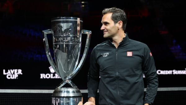 Roger Federer poses for a photograph with the Laver Cup Trophy after taking part in a live TV interview on CNBC at TD Garden on September 24, 2021 in Boston, Massachusetts. Clive Brunskill/Getty Images for Laver Cup/AFP (Photo by CLIVE BRUNSKILL / GETTY IMAGES NORTH AMERICA / Getty Images via AFP)