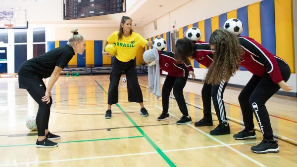 During the event QF Students Learn To Express Themselves – Using a Football