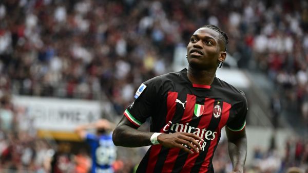 AC Milan's Portuguese forward Rafael Leao celebrates scoring his team's first goal during the Italian Serie A football match between AC Milan and Inter Milan at the San Siro stadium in Milan on September 3, 2022. (Photo by Miguel MEDINA / AFP)