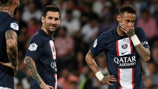 Paris Saint-Germain's Argentinian forward Lionel Messi (L) and Paris Saint-Germain's Brazilian forward Neymar react during the French L1 football match between Toulouse FC and Paris-Saint Germain (PSG) at Stadium TFC in Toulouse, southwestern France, on August 31, 2022. (Photo by Valentine CHAPUIS / AFP)