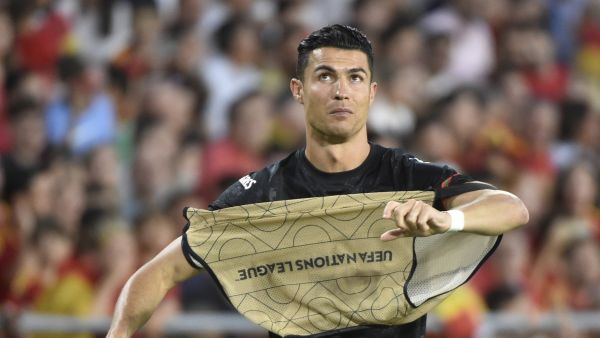 Portugal's forward Cristiano Ronaldo warms up on the sideline during the UEFA Nations League, league A group 2 football match between Spain and Portugal, at the Benito Villamarin stadium in Seville on June 2, 2022. (Photo by CRISTINA QUICLER / AFP)