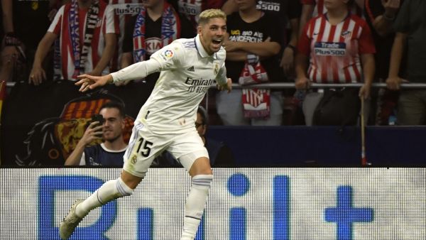 Real Madrid's Uruguayan midfielder Federico Valverde celebrates after scoring his team second goal during the Spanish League football match between Club Atletico de Madrid and Real Madrid CF at the Wanda Metropolitano stadium in Madrid on September 18, 2022. (Photo by OSCAR DEL POZO / AFP)