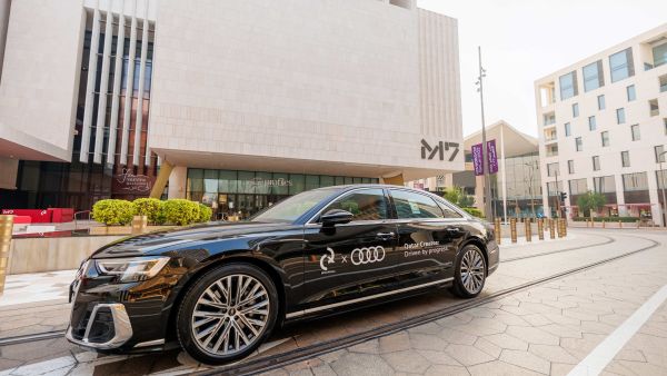 Driven by progress. Audi Qatar drives Qatar Creates.