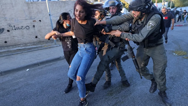 Palestinian woman treated roughly by Israeli soldiers  