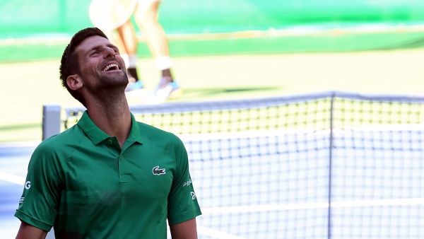 Serbian tennis player Novak Djokovic reacts during an exhibition match, organised to mark the opening of a tennis court at the "Archaeological park of the Bosnian pyramid" near Visoko, north of Sarajevo, on July 13, 2022. (Photo by ELVIS BARUKCIC / AFP)