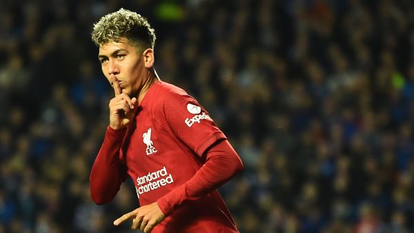 Liverpool's Brazilian striker Roberto Firmino celebrates scoring his team's first goal during the UEFA Champions League Group A football match between Glasgow Rangers and Liverpool at the Ibrox Stadium, in Glasgow, on October 12, 2022. (Photo by ANDY BUCHANAN / AFP)