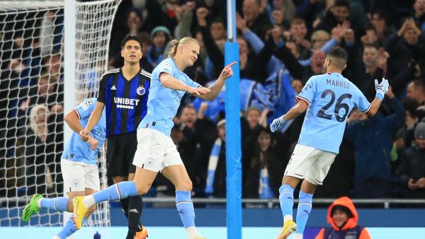 Manchester City's Norwegian striker Erling Haaland celebrates after scoring his team first goal during the UEFA Champions League group G football match between Manchester City and FC Copenhagen at the Etihad Stadium in Manchester, north west England on October 5, 2022. (Photo by Lindsey Parnaby / AFP)