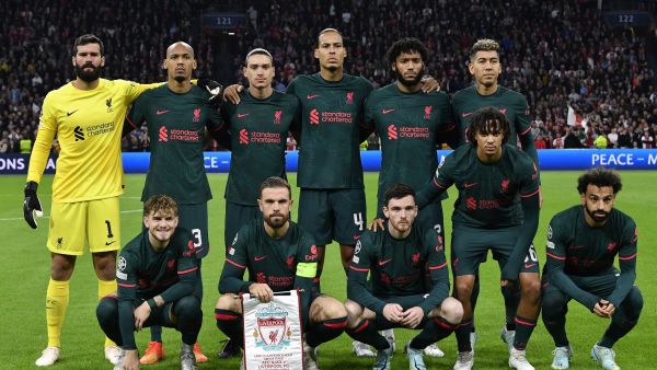 Liverpool players pose for a photograph before the kick-off of the UEFA Champions League group A football match between Ajax Amsterdam and Liverpool at the Johan Cruijff ArenA in Amsterdam, on October 26, 2022. (Photo by JOHN THYS / AFP)