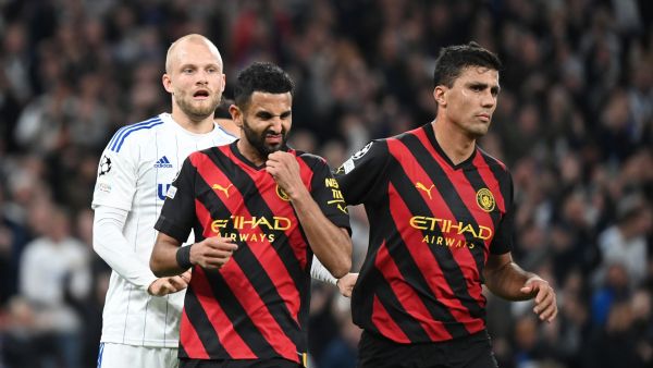 Manchester City's Algerian midfielder Riyad Mahrez (C) reacts after missing a penalty during the UEFA Champions League 1st round day 4 group G football match FC Copenhagen vs Manchester City in Copenhagen, Denmark, on October 11, 2022. (Photo by Jonathan NACKSTRAND / AFP)