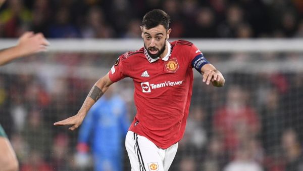 Manchester United's Portuguese midfielder Bruno Fernandes runs with the ball during the UEFA Europa League Group E football match between Manchester United and Omonoia Nicosia, at Old Trafford stadium, in Manchester, north-west England, on October 13, 2022. (Photo by Oli SCARFF / AFP)