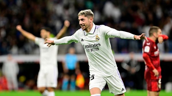 Real Madrid's Uruguayan midfielder Federico Valverde celebrates after scoring his team's third goal during the Spanish league football match between Real Madrid CF and Sevilla FC at the Santiago Bernabeu stadium in Madrid, on October 22, 2022. (Photo by JAVIER SORIANO / AFP)