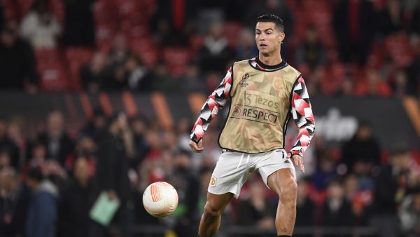 Manchester United's Portuguese striker Cristiano Ronaldo warms up ahead of the UEFA Europa League Group E football match between Manchester United and Omonoia Nicosia, at Old Trafford stadium, in Manchester, north-west England, on October 13, 2022. (Photo by Oli SCARFF / AFP)