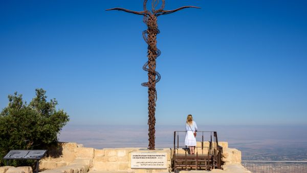 Serpentine Cross at the top of Mount Nebo in Jordan, place where Moses viewed the Holy Land