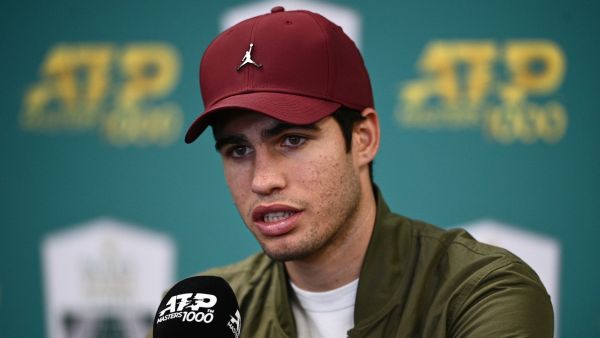 Spain's Carlos Alcaraz Garfia attends a press conference after giving up against Denmark's Holger Rune at the end of their men's singles quarter-final tennis match on day 5 of the ATP World Tour Masters 1000 - Paris Masters (Paris Bercy) - indoor tennis tournament at The AccorHotels Arena in Paris on November 4, 2022. (Photo by Christophe ARCHAMBAULT / AFP)