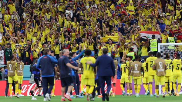 Ecuador players celebrate with their supporters after they won the Qatar 2022 World Cup Group A football match against Qatar at the Al-Bayt Stadium in Al Khor, north of Doha on November 20, 2022. (Photo by KARIM JAAFAR / AFP)