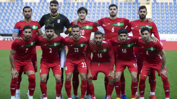 Players of Iran pose for a team photo prior to the friendly football match between Iran and Uruguay in Sankt Poelten, Austria on September 23, 2022. (Photo by Alex HALADA / AFP)