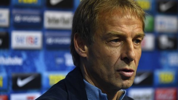 Juergen Klinsmann, former Germany and United States head coach, gives a press conference, on November 27, 2019 in Berlin, after German Bundesliga club Hertha Berlin announced he would take over as head coach until the end of the season. Former Hertha boss Ante Covic, who only took charge in July after six years coaching the reserves, has been dismissed after the November 24, 2019 4-0 thrashing at mid-table Augsburg, the club's fourth straight league defeat. / AFP / John MACDOUGALL