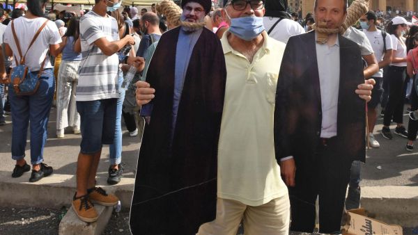 A poster of Nasrallah (L) and Bassil 