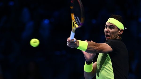 Spain's Rafael Nadal returns to USA's Taylor Fritz during their first round-robin match at the ATP Finals tennis tournament on November 13, 2022 in Turin. (Photo by MARCO BERTORELLO / AFP)