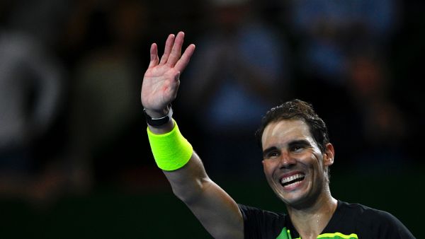 Spanish tennis player Rafael Nadal acknowledges the crowd during an exhibition match against Norwegian tennis player Casper Ruud on November 23, 2022, at Roca park in Buenos Aires. (Photo by Luis ROBAYO / AFP)